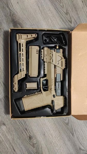 Іграшковий пластиковий пістолет Lizzy Tactical стріляє м'якими кулями з гільзою що відокремлюється 84 фото
