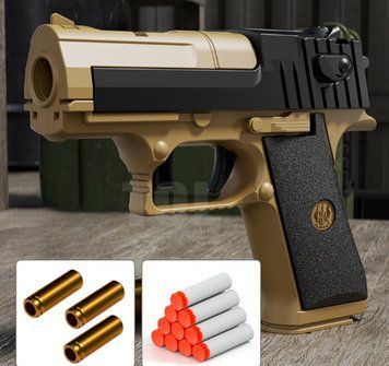 Іграшковий механічний дуельний пістолет бластер Кольт М1911 стріляє м'якими кулями з гільзою 0000317 фото