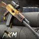 Игрушечный пластиковый электрический автомат Калашникова АКМ АК47 стреляет мягкими пульками 146 фото 3