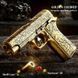 Іграшковий дитячий механічний пістолет кольт М1911 стріляє пластиковими кулями з гільзою 223 фото 1